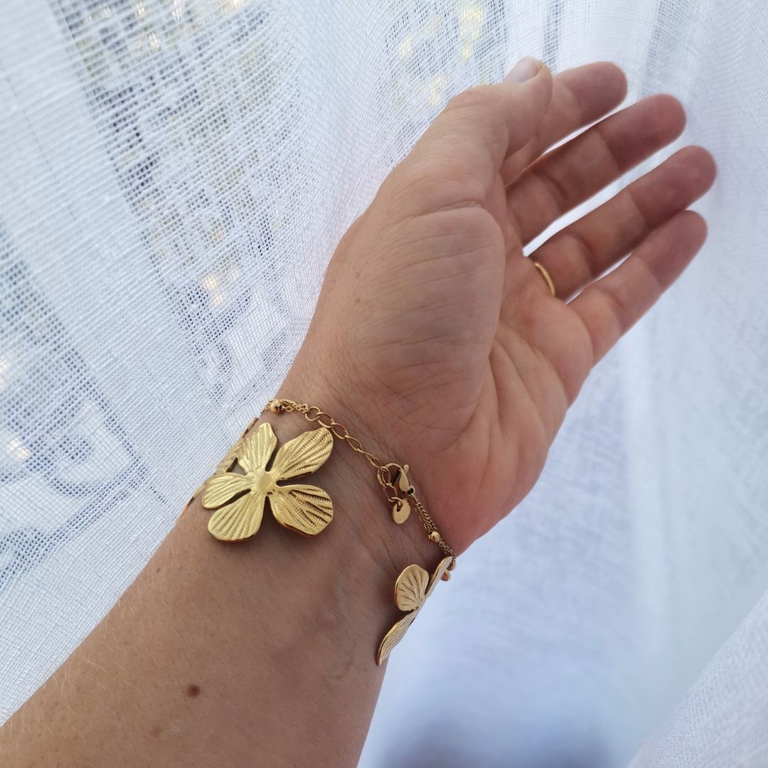 Bracelet jonc réglable fleur en acier inoxydable doré